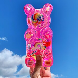 Giant resin gummy bear sculpture with fake candies - Pink pop art wall sculpture