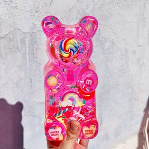 Giant resin gummy bear sculpture with fake candies - Pink pop art wall sculpture