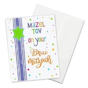 May include: A colorful card with the text "Mazel Tov on your Bnai Mitzvah" and a green star with a white outline. The card has a white background with blue and white stripes and colorful dots.