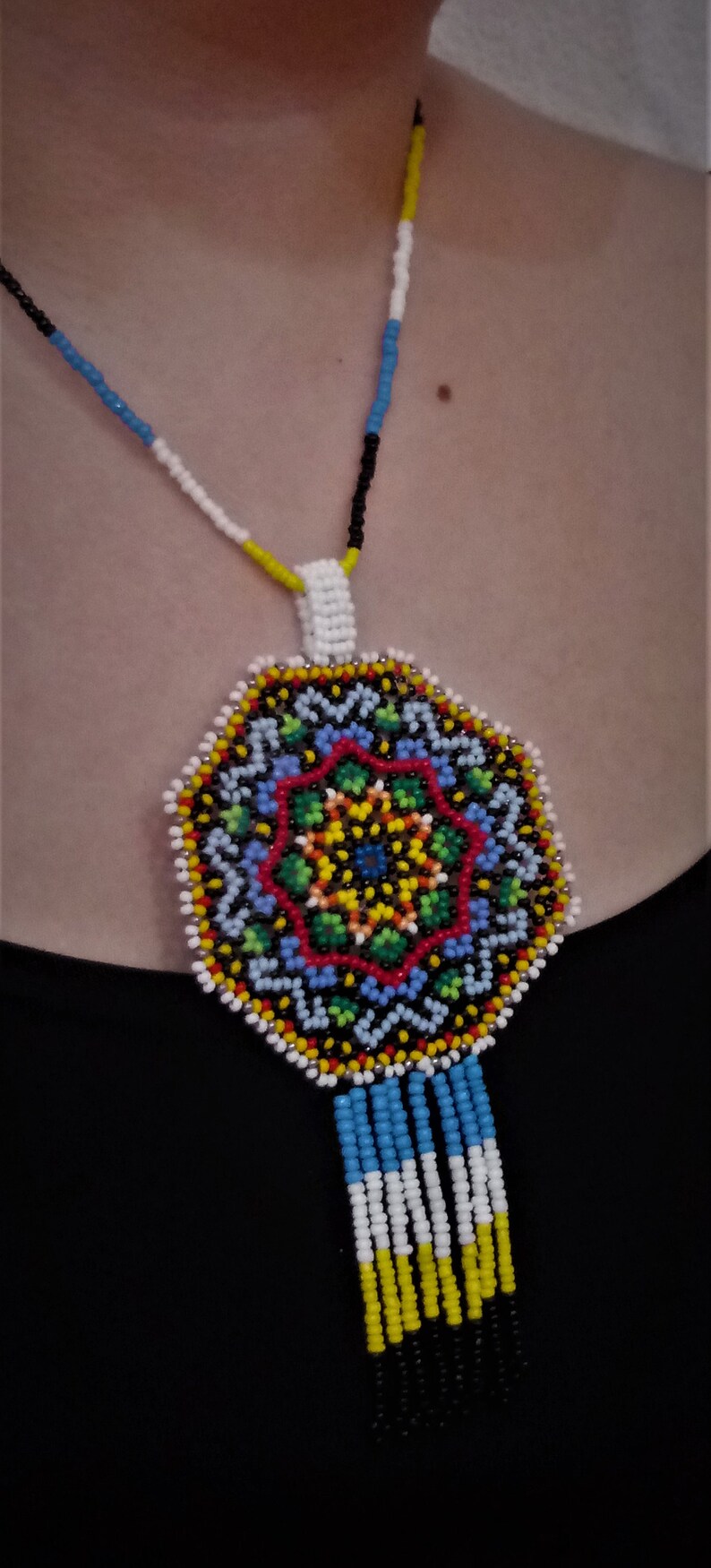 Huichol style mandala star