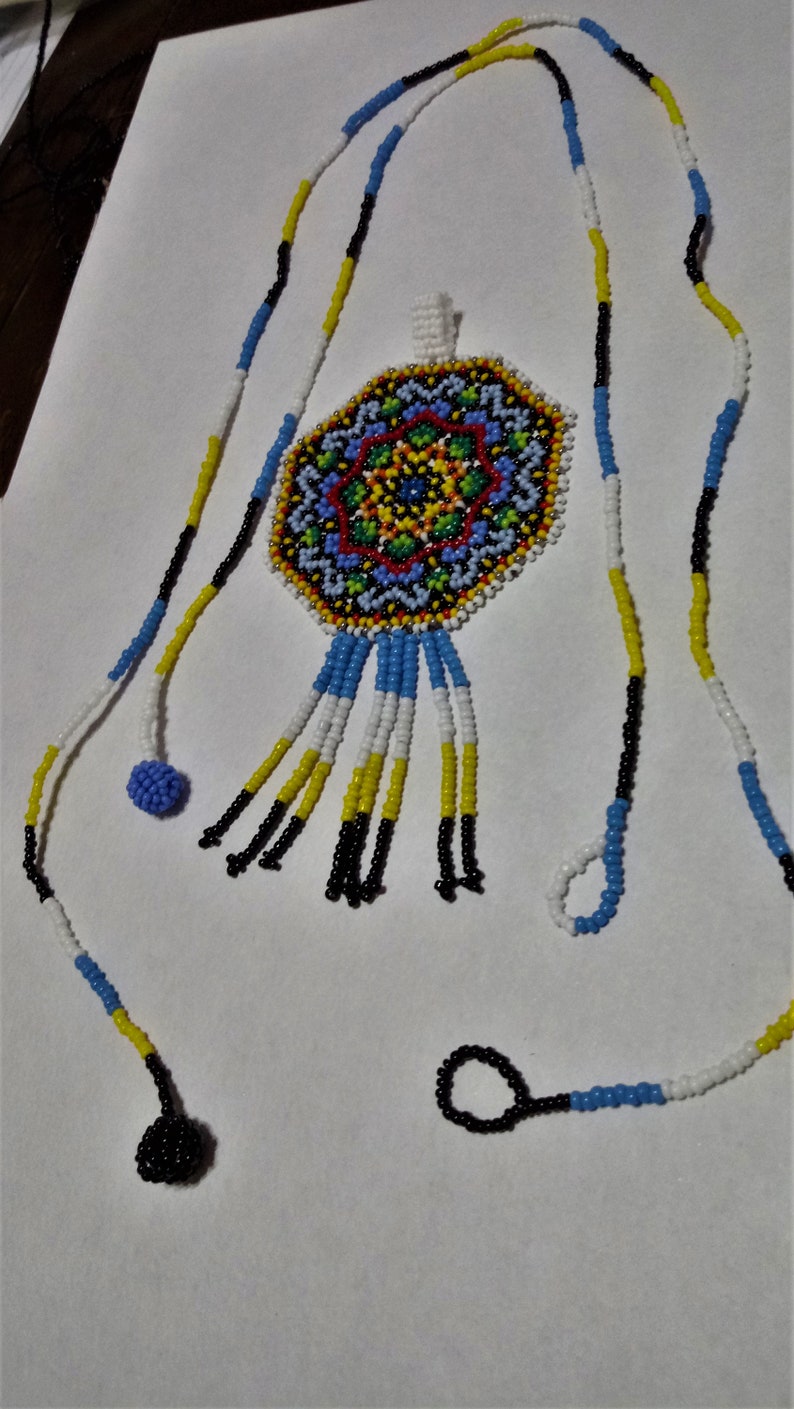 Huichol style mandala star