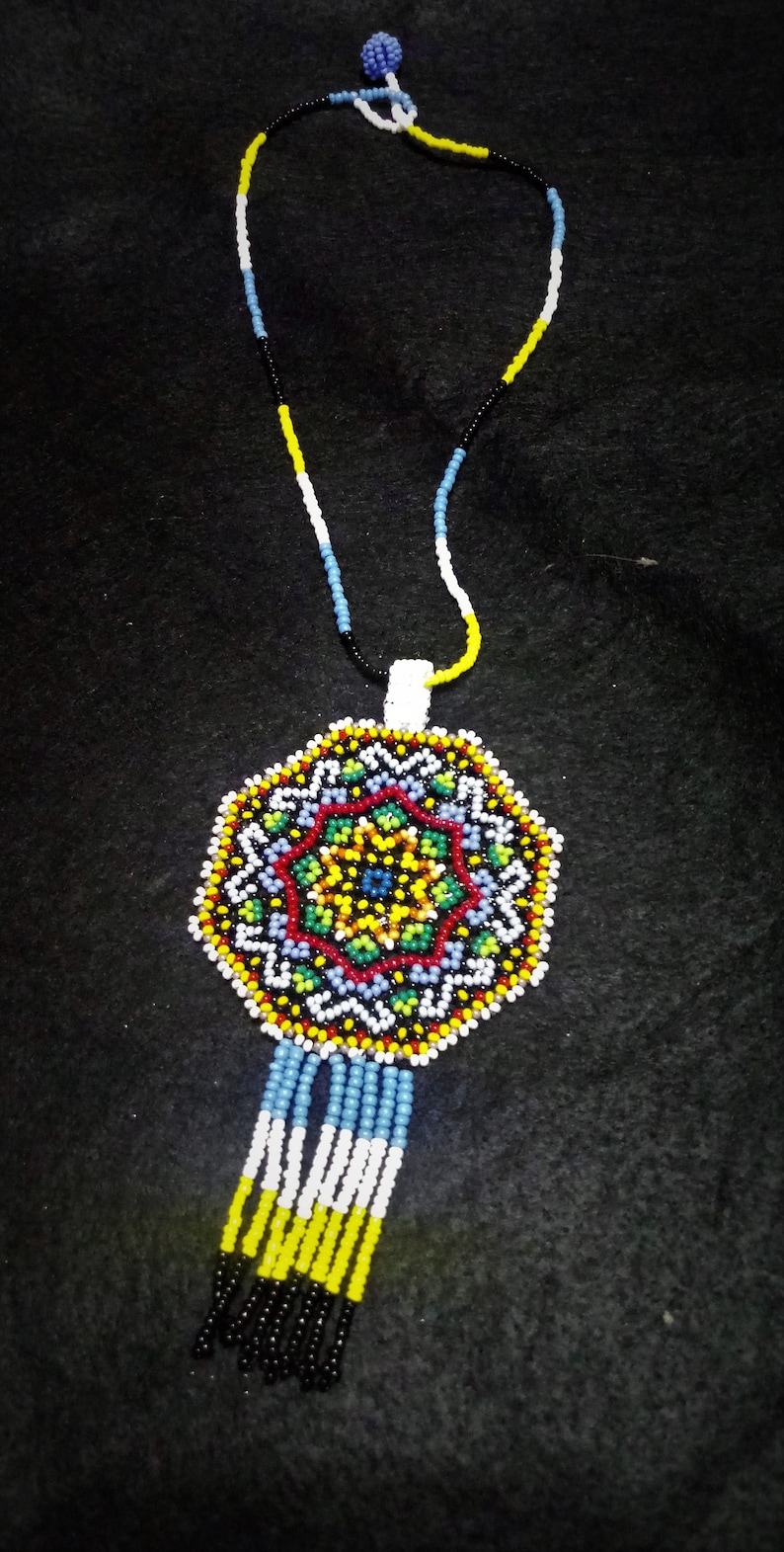 Huichol style mandala star