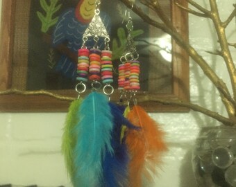 Handmade Earrings with Colored Pucca Discs and Feathers