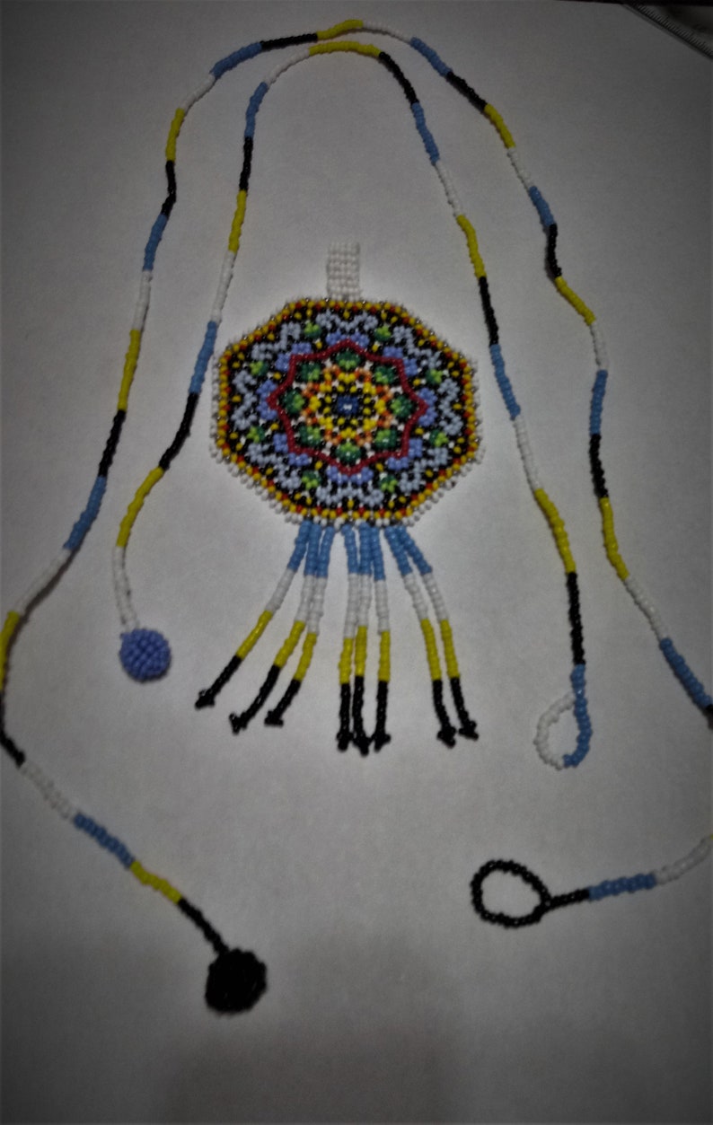 Huichol style mandala star