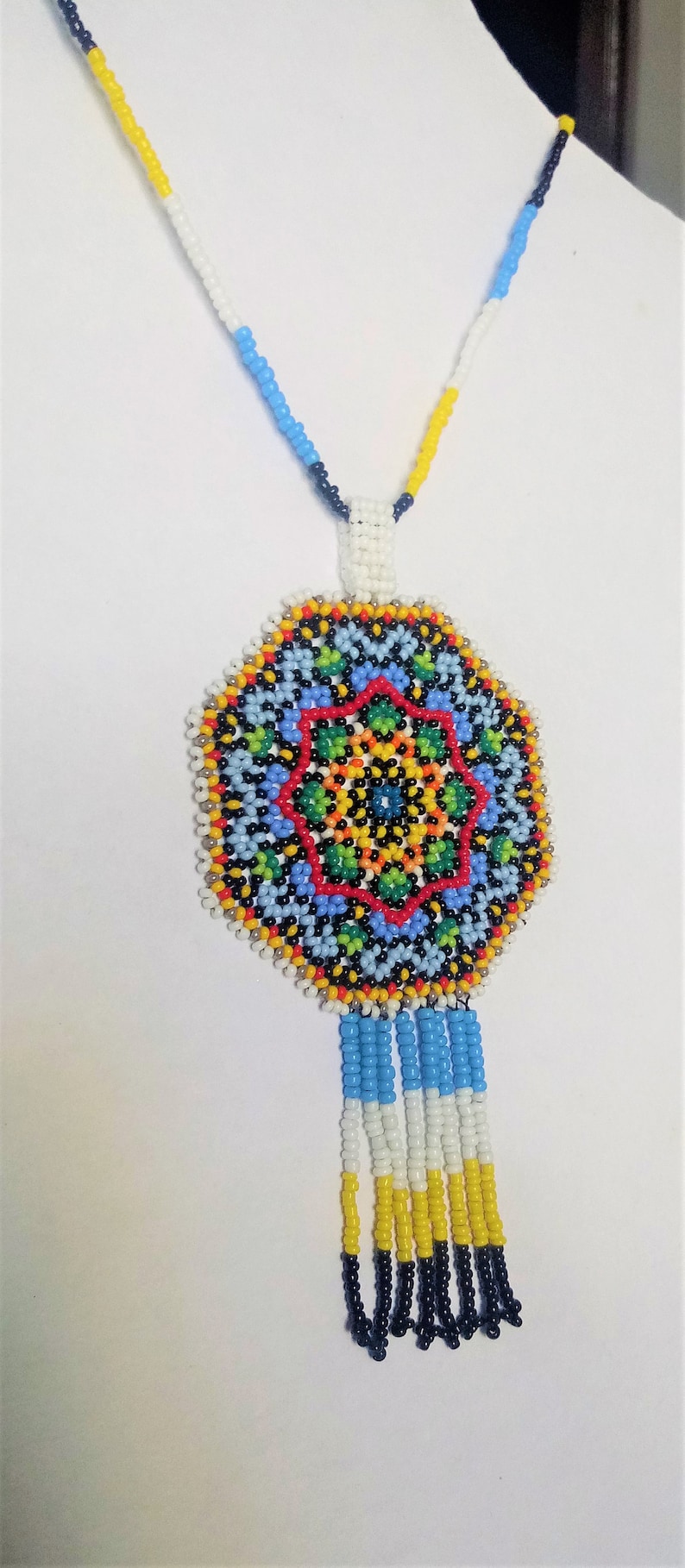Huichol style mandala star