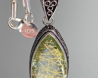 Golden Rutilated Quartz and Silver Pendant Including the Chain