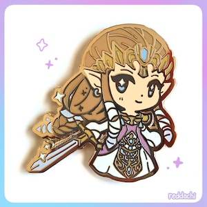 May include: A gold-colored enamel pin featuring a chibi-style illustration of a character with long, flowing hair, a crown, and a sword. The character is wearing a white and pink dress. The pin has a shiny finish and is set against a white and purple background.