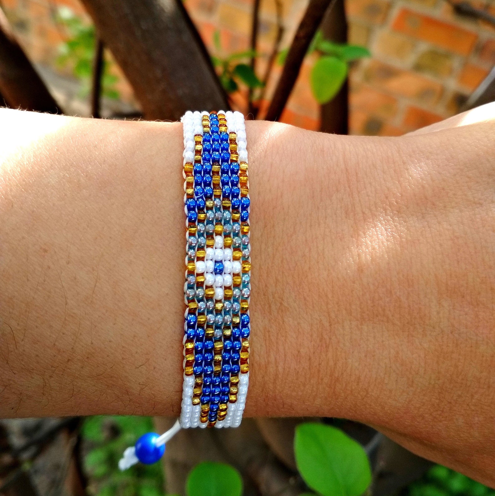 Woven bead bracelet with slip knot White bracelet with a blue Etsy
