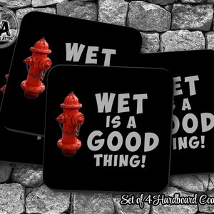 May include: Set of four black square-shaped coasters with a red fire hydrant graphic and the text "Wet is a good thing!" in white. The coasters are made of hardboard.