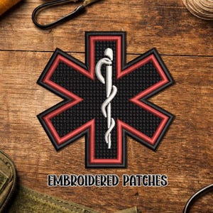 May include: Embroidered patch featuring the Star of Life, a six-pointed star with a white staff and serpent symbol. The patch has a black background with red and black borders. The text "EMBROIDERED PATCHES" is below the patch.