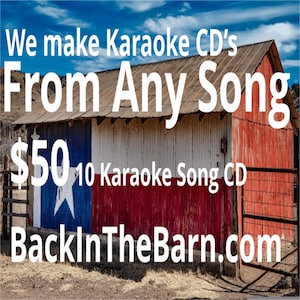 May include: A red, white, and blue barn with a Texas flag painted on the side. The barn has a metal roof and a wooden door. The text "We make Karaoke CD's From Any Song $50 10 Karaoke Song CD BackInTheBarn.com" is written on the barn.
