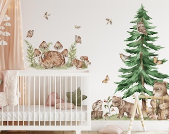 May include: A set of woodland animal wall decals featuring a sleeping fawn, a bear cub, a hedgehog, a squirrel, mushrooms, birds, butterflies, and a pine tree. The decals are perfect for a nursery or child's room.