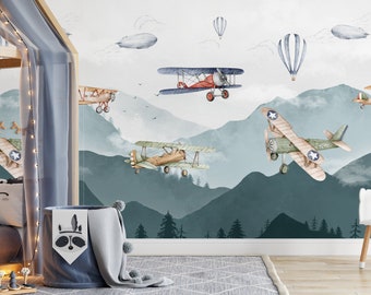 Wallpaper for a boy&#39;s room Vintage Airplanes, Balloons and an Airship among the mountains and clouds