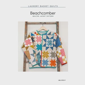May include: A vibrant, quilted jacket with a star design, displayed on a wooden hanger. The jacket is set against a light backdrop. The text "Beachcomber Quilted Jacket Pattern" is visible. The jacket incorporates blue, pink, and yellow hues.