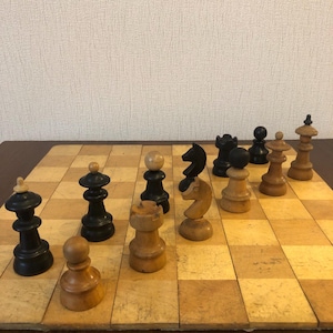Vintage Coffee House Chess Set: Post-War Europe with a roll-up chessboard