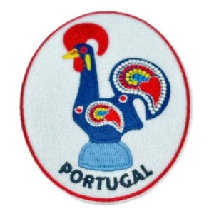 May include: Embroidered patch depicting a blue rooster with red comb and accents, yellow beak, and a decorative tail. The rooster is set against a white background with a red border, and the word "PORTUGAL" is at the bottom.