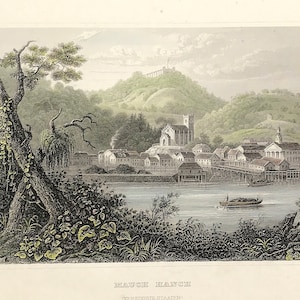 May include: An antique, hand-colored print depicting a townscape with a river, buildings, and a church. A large tree is in the foreground, and a hill with a structure is in the background. The print is labeled "MAUCH HANCH, TREXTLER STAATEN."