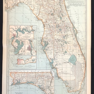 May include: Vintage map of Florida, showing detailed geographical features. The map includes insets of coastal regions and a key. The colour scheme uses muted tones of beige, blue, and brown, with text labels and grid lines.