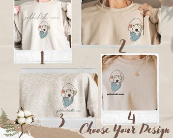 May include: Four sweatshirt designs are displayed, each featuring a line drawing of a Goldendoodle dog wearing a bandana. The sweatshirts are in neutral colors, with text options including "Goldendoodle Mama" and "Goldendoodle Non". The phrase "Choose Your Design" is also present.