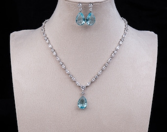 Exclusive New Luxury jewellery set with 5A Cubic Zirconia and Large Simulated Aquamarine pendant and earrings drops.