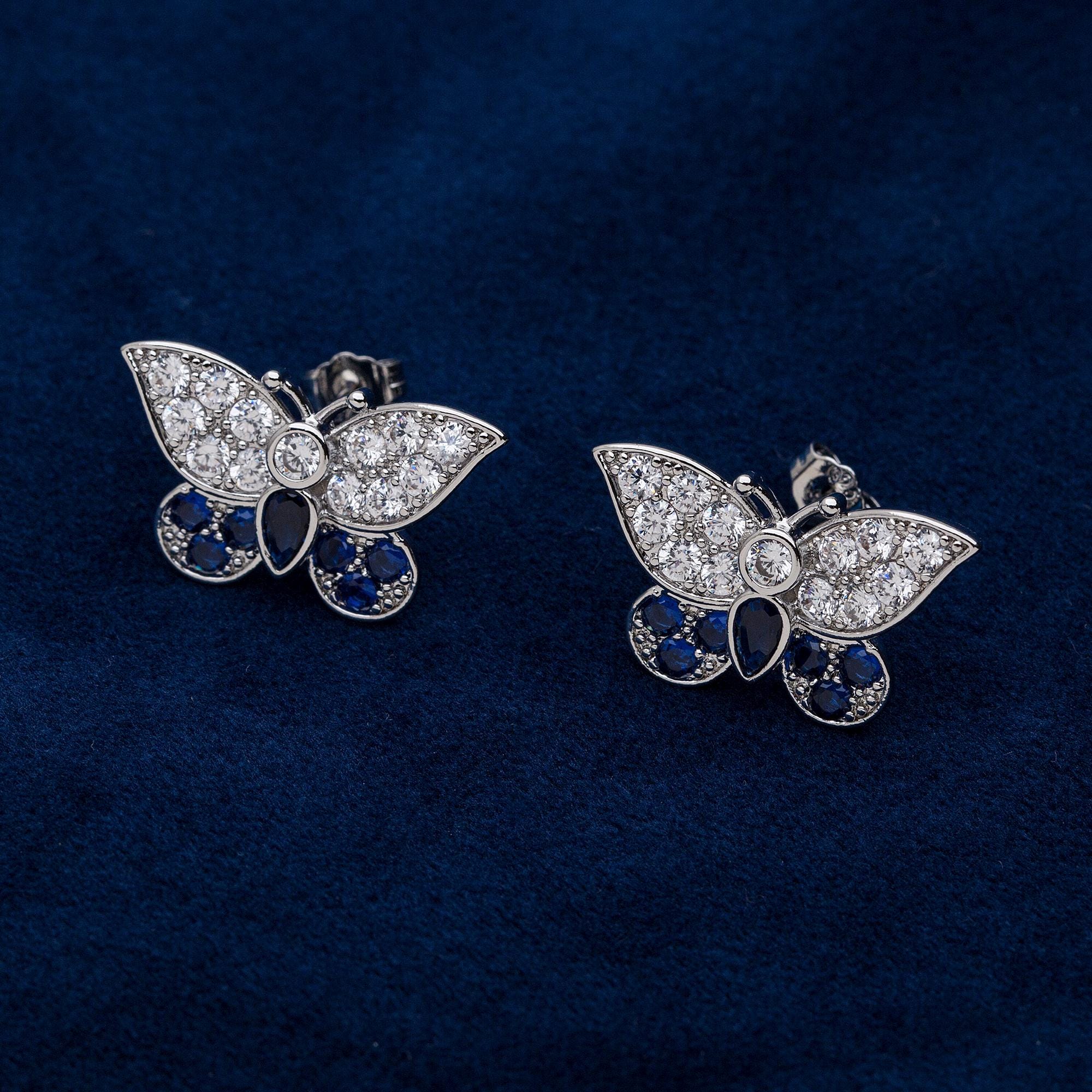 Coppia di splendidi orecchini a perno unisex in argento con zirconia