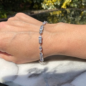 Simulated Diamond cubic Zirconia multishape Stone tennis Bracelet set in Solid 925 sterling silver and rhodium Plated