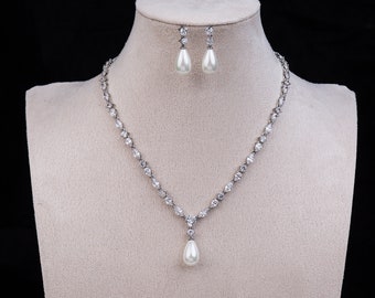 Exclusive New Luxury Rhodium Plated Jewellery Set with 5A Cubic Zirconia and Shell Pearl Pendant and Earring Drops