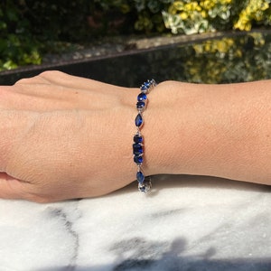 Simulated Sapphire Blue cubic Zirconia multishape Stone tennis Bracelet set in Solid 925 sterling silver and rhodium Plated