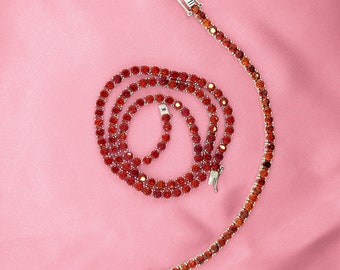 Red Tennis Necklaces and Bracelets in 18k Triple White Gold Plated Simulated Ruby 7 inch & 17 inch, 4mm stones.