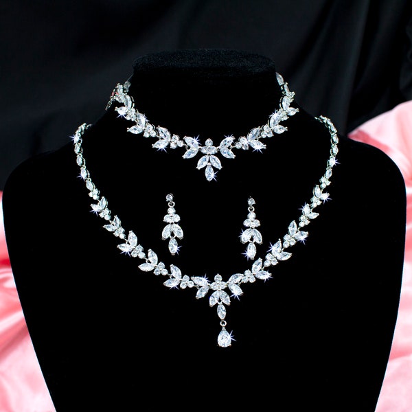 Glamorous Simulated Diamond Necklace and Earrings Set. Rhodium Plated and 5A Cubic Zirconia with the option to add a Bracelet
