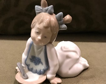 Vintage Nao Baby with Food Figurine by Lladro Figurine