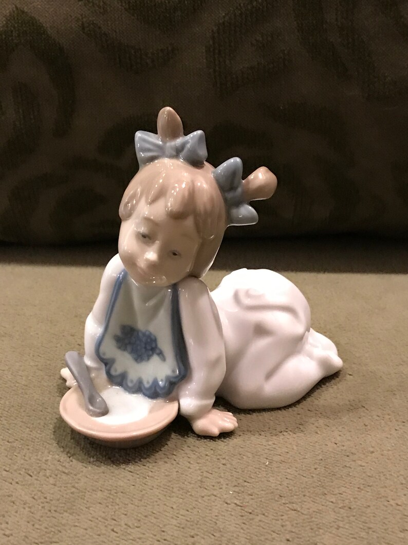 Vintage Nao Baby with Food Figurine by Lladro Figurine image 1