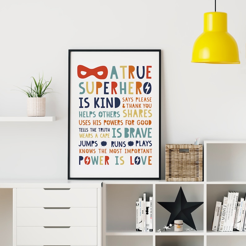 May include: A colorful printable poster with the text "A True Superhero is Kind, Says Please & Thank You, Helps Others, Shares, Uses His Powers for Good, Tells the Truth, Is Brave, Wears a Cape, Jumps, Runs, Plays, Knows the Most Important, Power is Love".