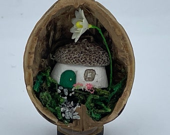 Acorn Cottage in a Nutshell handmade decoration.