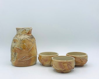 4-Piece Japanese Style Wood Fired Scribble Ceramic Sake Bottle and Cups Set by Amy Schnitzer