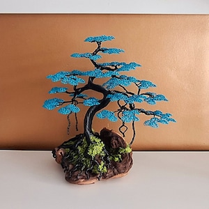 Large wire bonsai tree sculpture attached to wood. Tree ornament.
