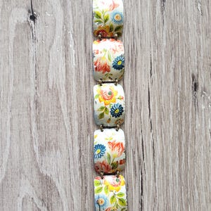 Vintage tin bracelet floral garland tin link upcycle vintage candy tin hand hammered with magnetic clasp segmented cuff comfortable light