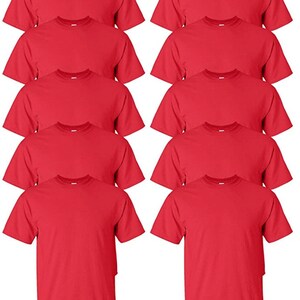May include: A collection of ten solid red crew neck t-shirts. The shirts are neatly arranged, showcasing their short sleeves and classic design. The fabric appears to be a medium weight cotton, suitable for casual wear.