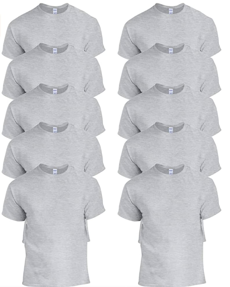 May include: A collection of ten heather gray crew neck t-shirts. Each short-sleeved shirt has a tag attached. The shirts are neatly arranged in two columns of five.