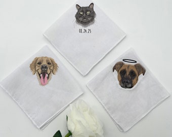 May include: Three white handkerchiefs, each embroidered with a pet portrait: a golden retriever, a black cat, and a brown dog with a halo. The cat handkerchief has the date "08.24.25" embroidered below. A white rose is in the foreground.