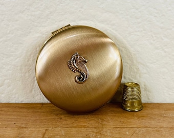 Brass Toned Volupte' Seahorse Compact with Light Pink Pressed Powder and Powder Puff