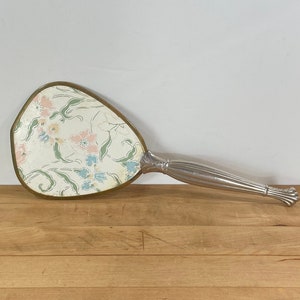 Old Hand Mirror, Floral Design backing and Beveled Mirror, Brass Tone Frame and Silver Tone Handle