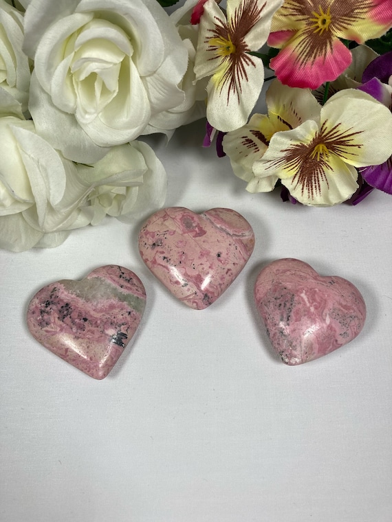 Peruvian rhodonite hearts | rhodonite | crystal carving | heart carving | crystal heart | pink crystals | crystal heart | from peru | pink