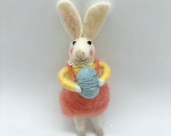 Felt Bunny Rabbit in Coral Pink Wool Skirt with suspenders, yellow shirt holding a blue felt egg, hanging Spring Easter ornament