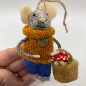 Felt Mouse Gardener, holds a Basket of Red Lucky Christmas Mushrooms it has gathered up, Woodland Lucky Mushroom Gatherer, Gnome Friend