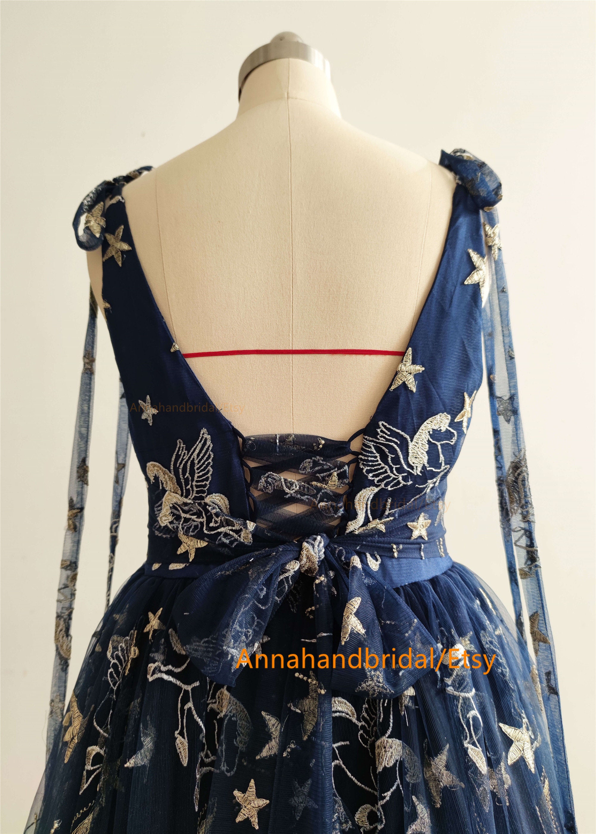Navy dress top with gold stars