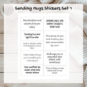 May include: A set of white stickers with black text, featuring phrases like "Sending love and light from afar" and "Wishing you a peaceful day filled with small joys." The stickers are labeled "Sending Hugs Stickers Set 1."