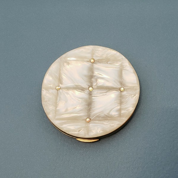 Brass Art Deco Round Cosmic Powder Compact with Cushioned Faux Mother of Pearl and Rhinestone Lid