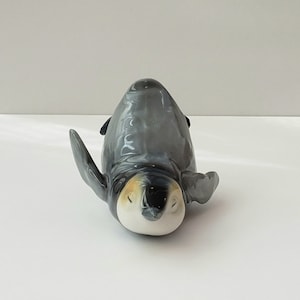 Porcelain Sleeping Baby Penguin Figurine