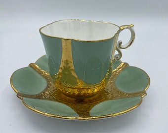 Aynsley tea cup and saucer number 1219 light green with gold